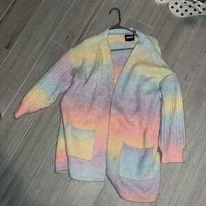 Multi color cardigan. Never worn. Size M/L from boutique.